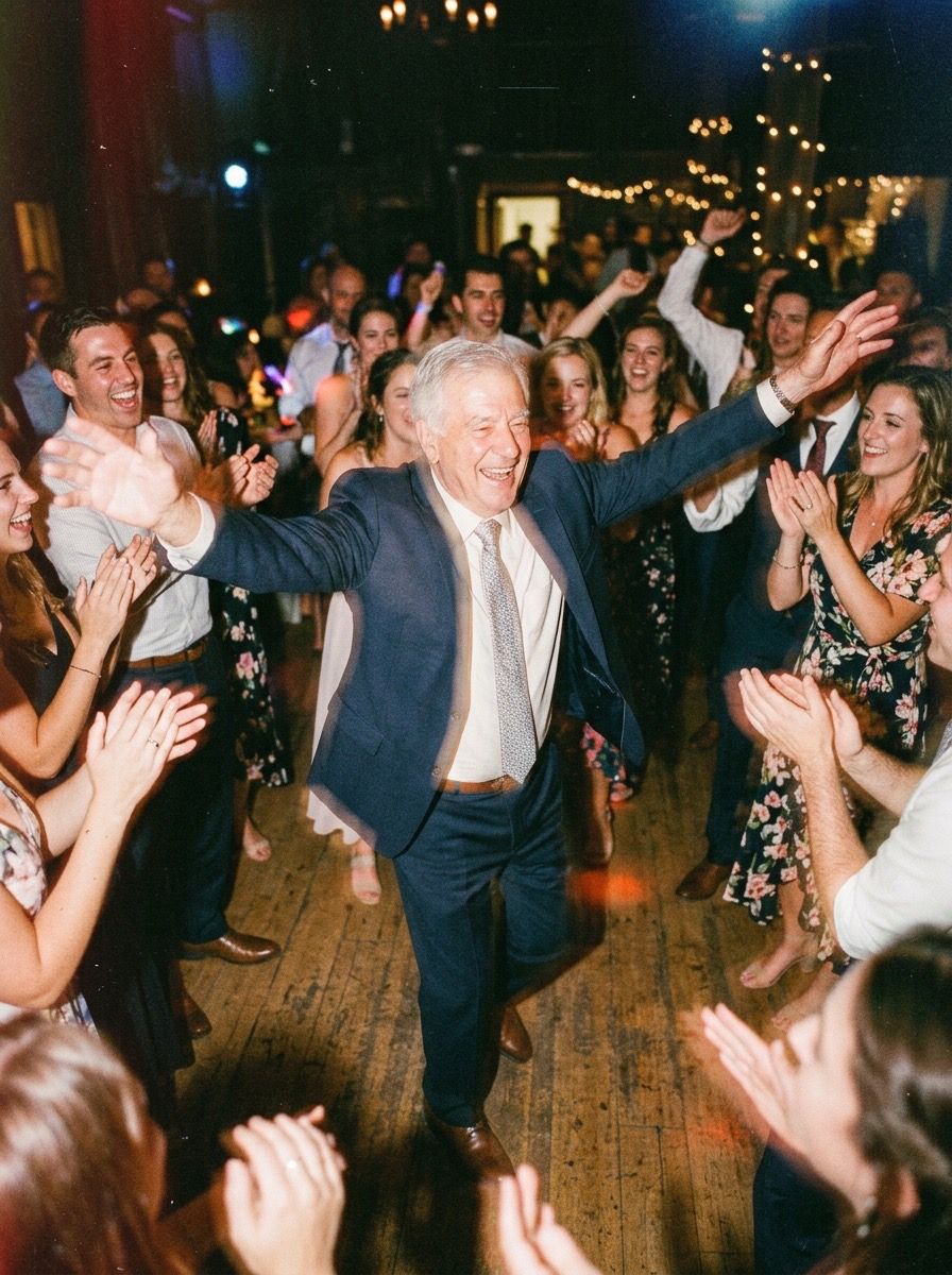 A grandfather dancing at a wedding